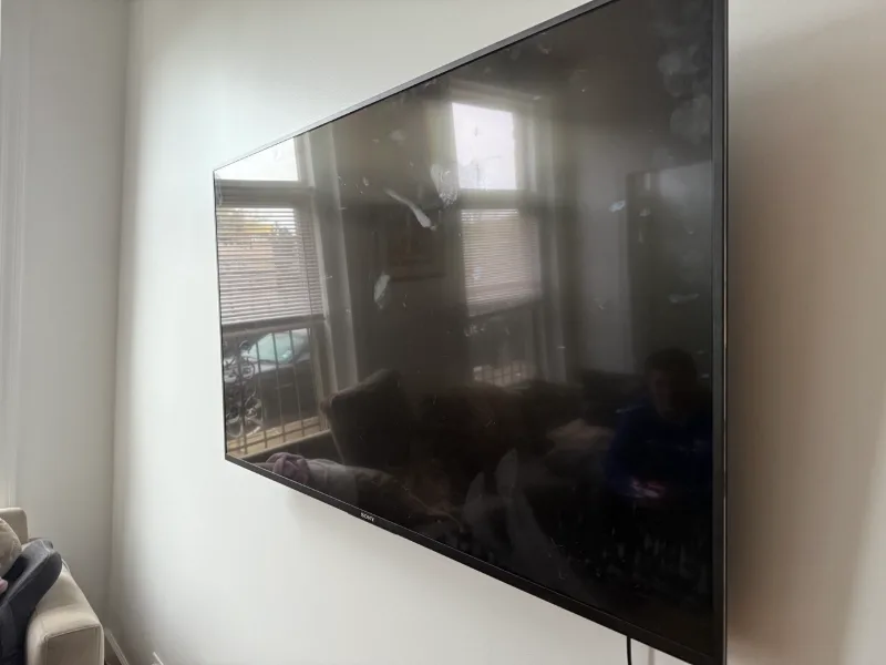 Sony TV wall mounted in a Chicago apartment living room